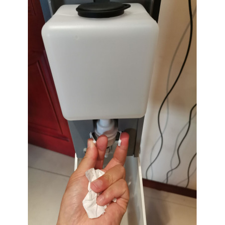 Automatic sterilizing dispenser for hands with battery photocell sensor